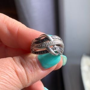 Silver ring with black and white diamonds